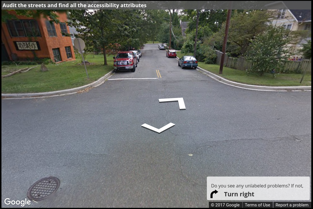 A Street View image of a corner with no curb ramps and no sidewalk