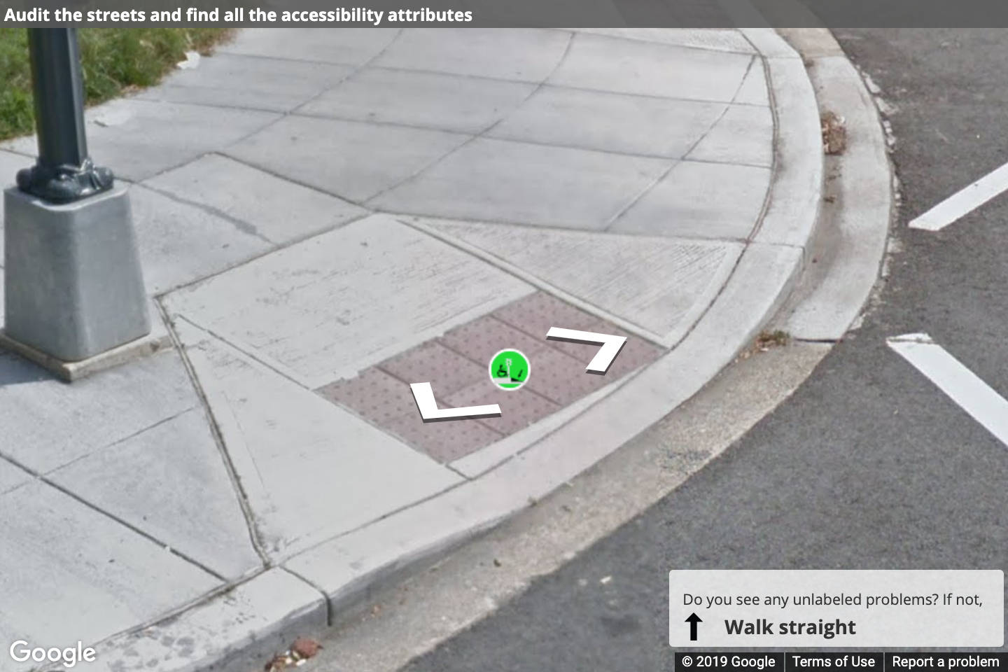 A Street View image of a curb ramp with a label